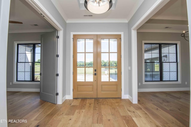256 Watercrest Dr, Vonore, TN 37885 - entrance foyer featuring french doors, ornamental molding, and light wood-type flooring