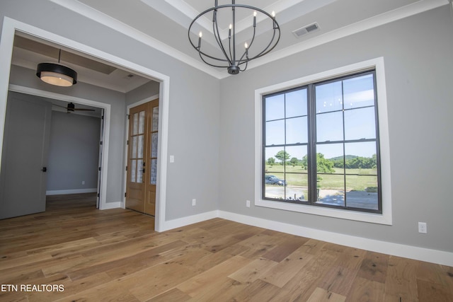 256 Watercrest Dr, Vonore, TN 37885 - empty room with plenty of natural light, light wood-style floors, and a chandelier