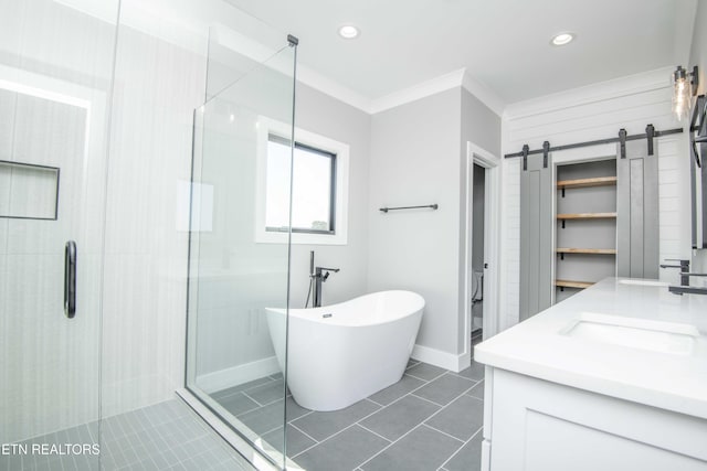 256 Watercrest Dr, Vonore, TN 37885 - full bathroom featuring a stall shower, a freestanding bath, double vanity, crown molding, and tile patterned flooring