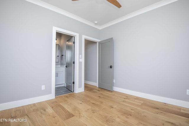 256 Watercrest Dr, Vonore, TN 37885 - unfurnished bedroom with light wood-style floors, ornamental molding, ensuite bathroom, and ceiling fan