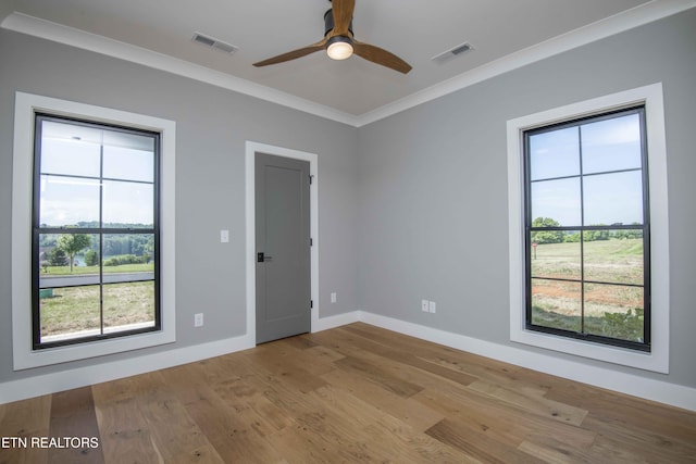 256 Watercrest Dr, Vonore, TN 37885 - unfurnished room featuring wood finished floors, a ceiling fan, and crown molding