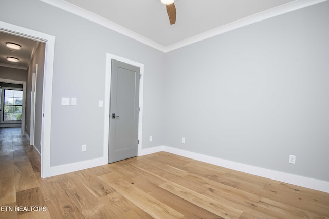 256 Watercrest Dr, Vonore, TN 37885 - spare room featuring crown molding, ceiling fan, and light wood-type flooring