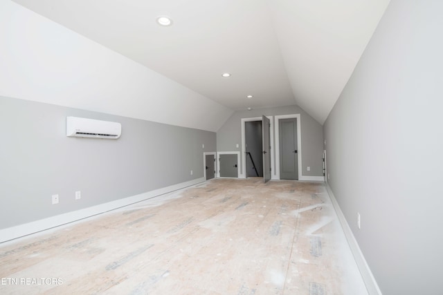 256 Watercrest Dr, Vonore, TN 37885 - additional living space featuring a wall unit AC, vaulted ceiling, and recessed lighting