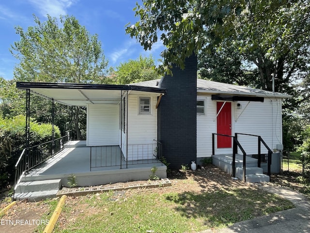 3431 Skyline Dr, Knoxville, TN 37914 - view of front of home featuring a chimney and a porch
