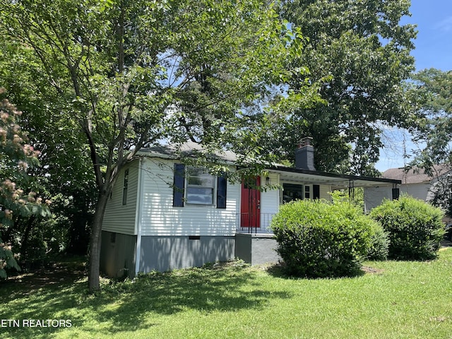 3431 Skyline Dr, Knoxville, TN 37914 - view of front of house with a front yard and a chimney