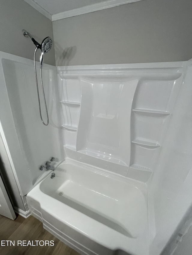 3431 Skyline Dr, Knoxville, TN 37914 - bathroom featuring wood finished floors, crown molding, and bathtub / shower combination
