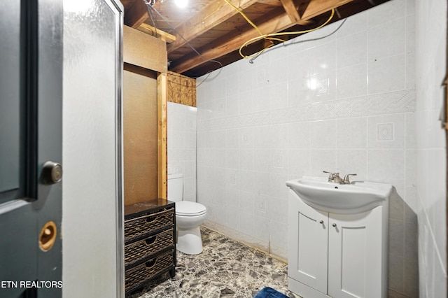 564 Dillwyn St, Kingsport, TN 37665 - full bathroom featuring vanity, tile walls, and a shower