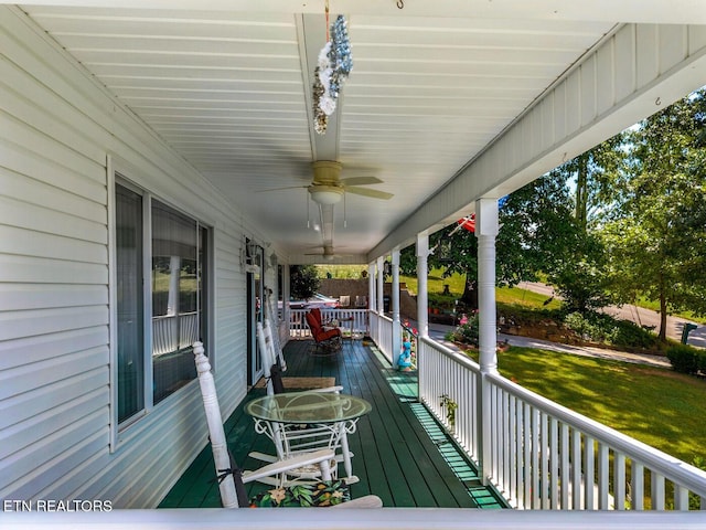 133 Rolling Hls, Rutledge, TN 37861 - wooden porch featuring a ceiling fan and a yard