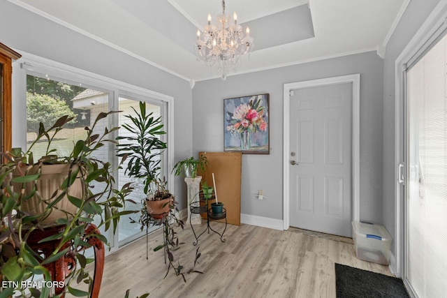 133 Rolling Hls, Rutledge, TN 37861 - entryway with ornamental molding, a chandelier, and light wood-style flooring