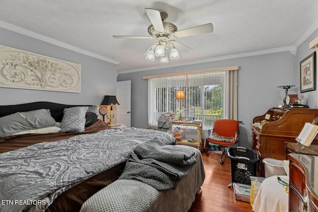 133 Rolling Hls, Rutledge, TN 37861 - bedroom featuring wood-type flooring, ornamental molding, a textured ceiling, and a ceiling fan