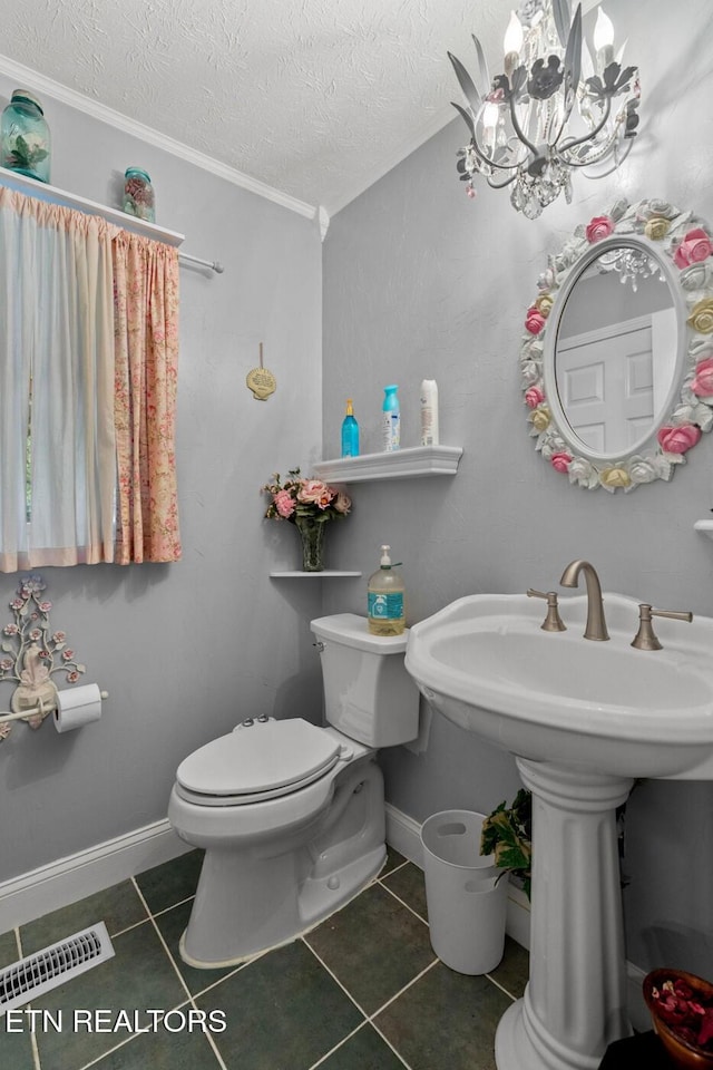 133 Rolling Hls, Rutledge, TN 37861 - half bath with ornamental molding, tile patterned flooring, a textured ceiling, and a chandelier