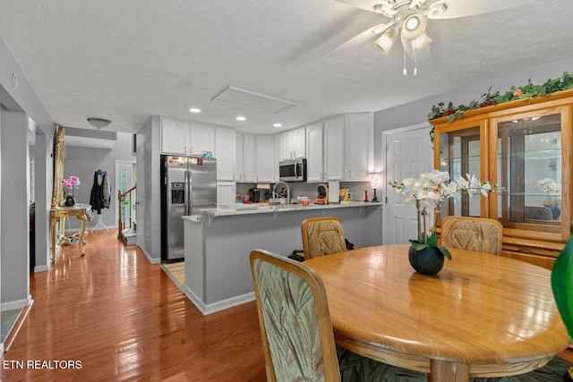 133 Rolling Hls, Rutledge, TN 37861 - dining space featuring light wood finished floors, ceiling fan, attic access, a textured ceiling, and recessed lighting