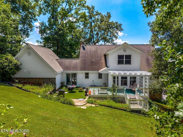 133 Rolling Hls, Rutledge, TN 37861 - back of property with a sunroom, a yard, a wooden deck, and roof with shingles