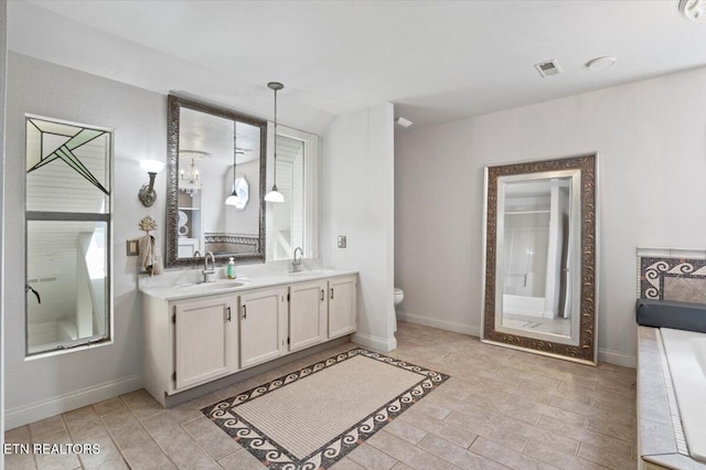 700 Shanghai Landing Ln Unit 11, Lafollette, TN 37766 - bathroom featuring double vanity and toilet