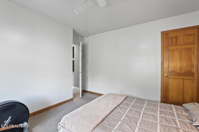 700 Shanghai Landing Ln Unit 11, Lafollette, TN 37766 - carpeted bedroom with baseboards and a ceiling fan