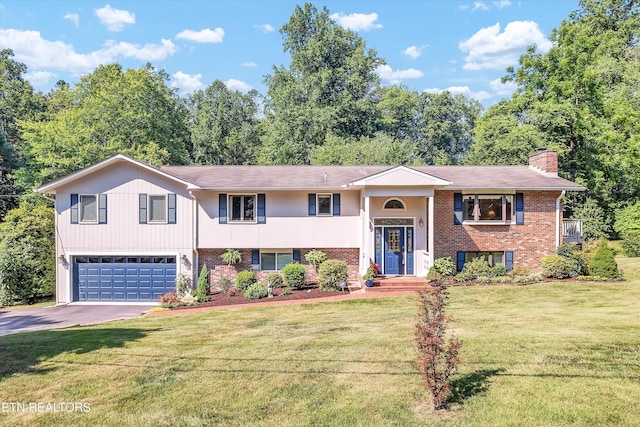 127 Newhaven Rd, Oak Ridge, TN 37830 - bi-level home featuring a garage, brick siding, asphalt driveway, a chimney, and a front lawn