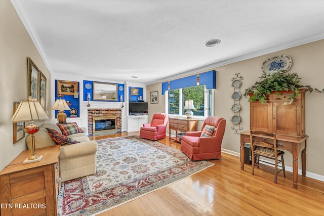127 Newhaven Rd, Oak Ridge, TN 37830 - living area featuring ornamental molding, wood finished floors, and a brick fireplace