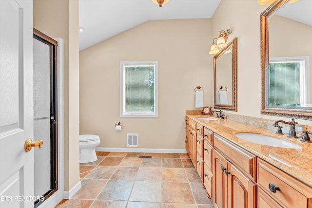 127 Newhaven Rd, Oak Ridge, TN 37830 - bathroom with vaulted ceiling, double vanity, and a shower with door