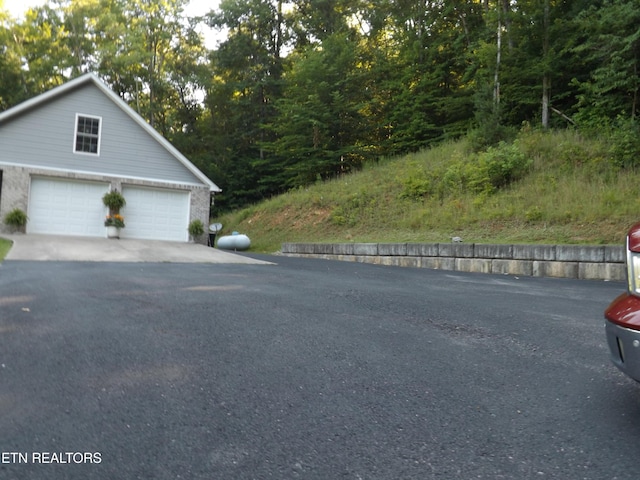440 Sams Mtn, Middlesboro, KY 40965 - view of home's exterior with a detached garage