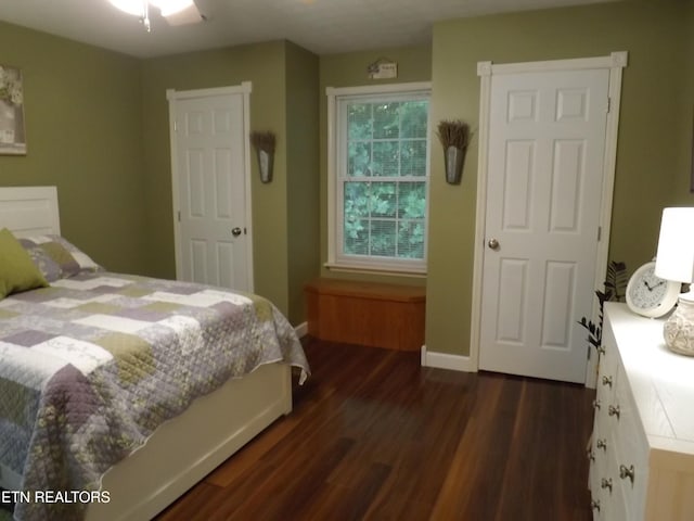 440 Sams Mtn, Middlesboro, KY 40965 - bedroom with dark wood-style flooring and baseboards