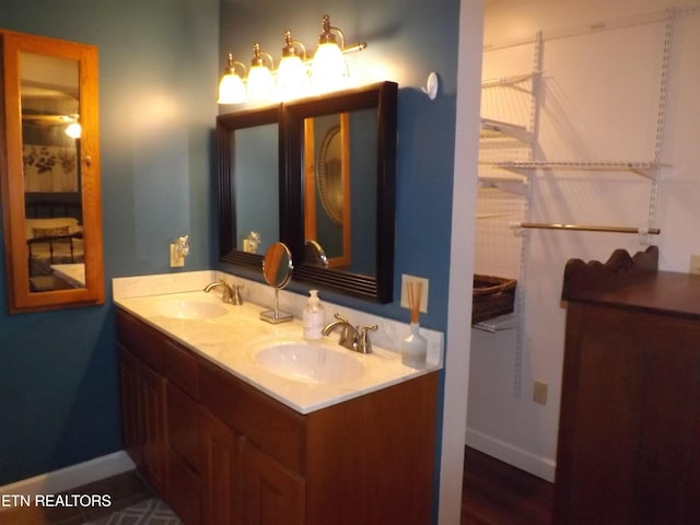 440 Sams Mtn, Middlesboro, KY 40965 - bathroom with double vanity and baseboards