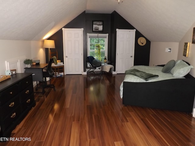 440 Sams Mtn, Middlesboro, KY 40965 - bedroom featuring an office area, dark wood-style flooring, and vaulted ceiling