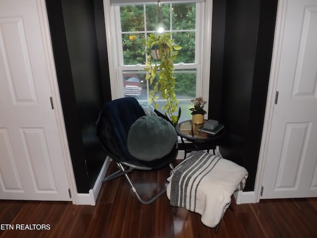 440 Sams Mtn, Middlesboro, KY 40965 - sitting room with dark wood finished floors and baseboards