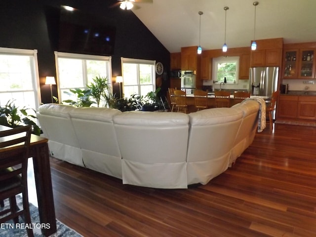 440 Sams Mtn, Middlesboro, KY 40965 - living room with dark wood-style flooring, a ceiling fan, and high vaulted ceiling
