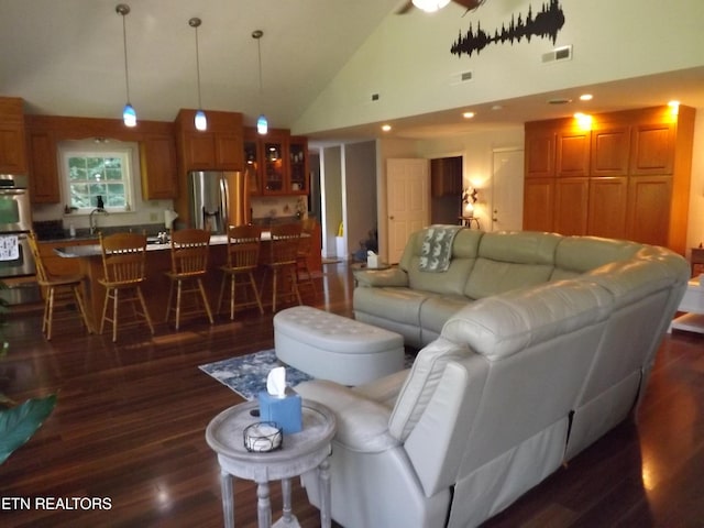 440 Sams Mtn, Middlesboro, KY 40965 - living room with high vaulted ceiling, dark wood-type flooring, and ceiling fan