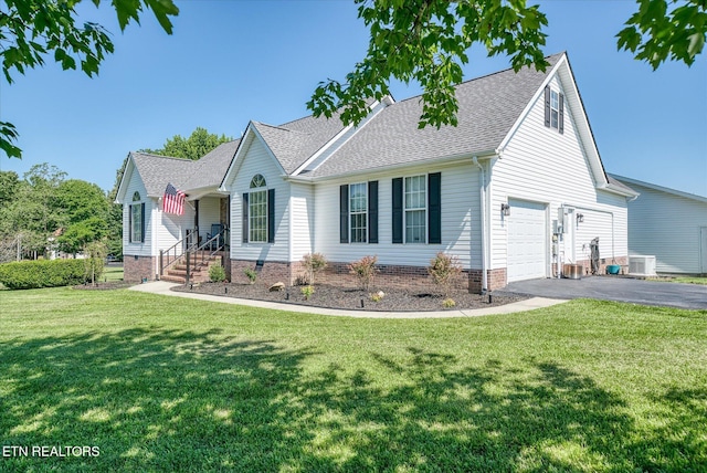1036 Circle Dr, Jamestown, TN 38556 - view of front of property with asphalt driveway, roof with shingles, and a front lawn