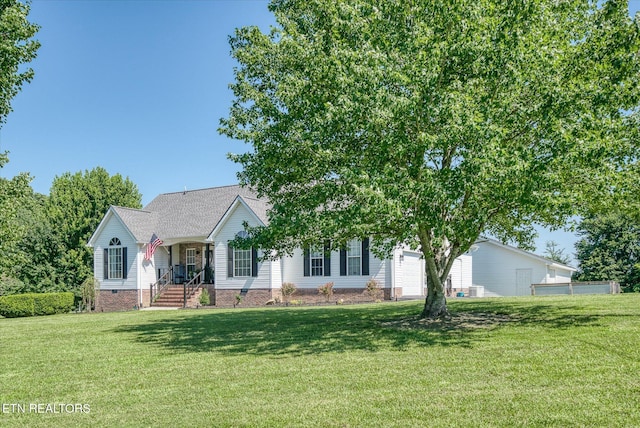 1036 Circle Dr, Jamestown, TN 38556 - view of front facade featuring crawl space, a front yard, a porch, and an attached garage