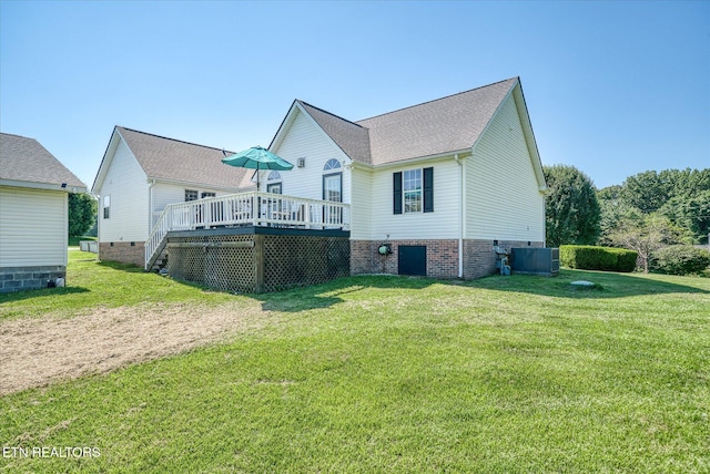 1036 Circle Dr, Jamestown, TN 38556 - back of property featuring a deck and a lawn