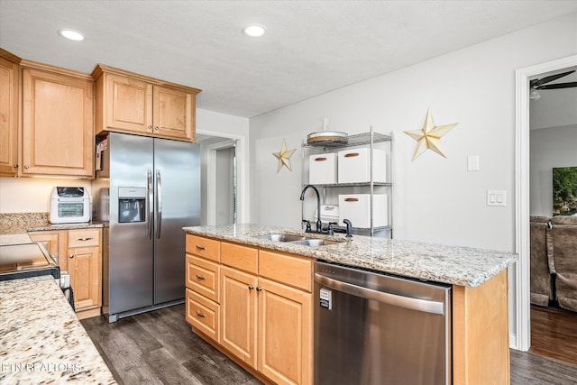 1036 Circle Dr, Jamestown, TN 38556 - kitchen featuring appliances with stainless steel finishes, dark wood-style floors, a kitchen island with sink, light brown cabinetry, and recessed lighting