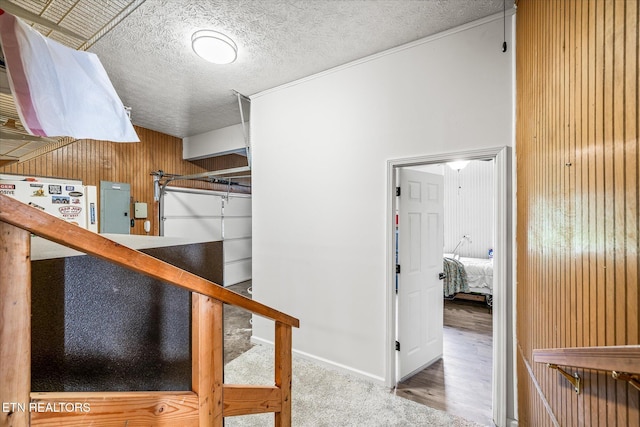1036 Circle Dr, Jamestown, TN 38556 - stairs with wood walls and a textured ceiling