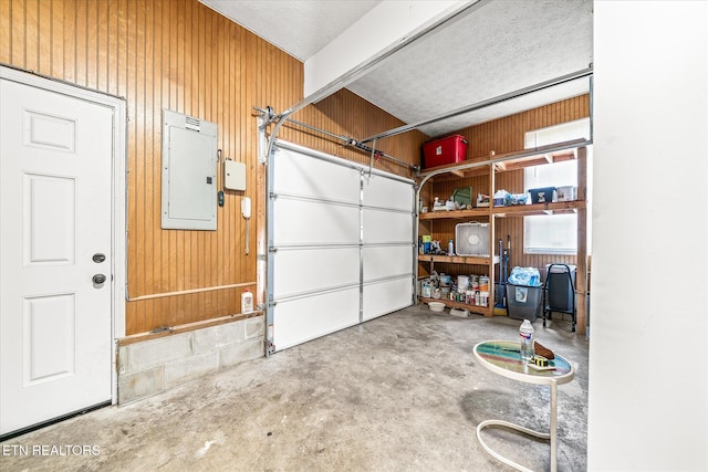 1036 Circle Dr, Jamestown, TN 38556 - garage with electric panel and wood walls