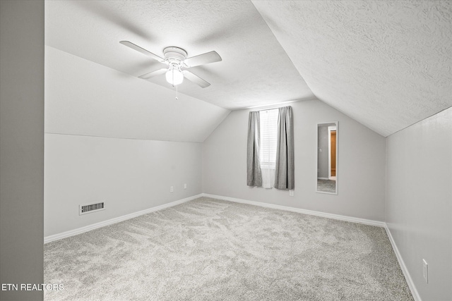 1036 Circle Dr, Jamestown, TN 38556 - bonus room with a textured ceiling, carpet, lofted ceiling, and ceiling fan