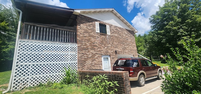 191 Ashley Ln, Oneida, TN 37841 - view of side of property featuring brick siding