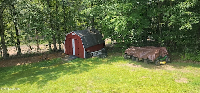 191 Ashley Ln, Oneida, TN 37841 - view of grassy yard featuring a storage shed