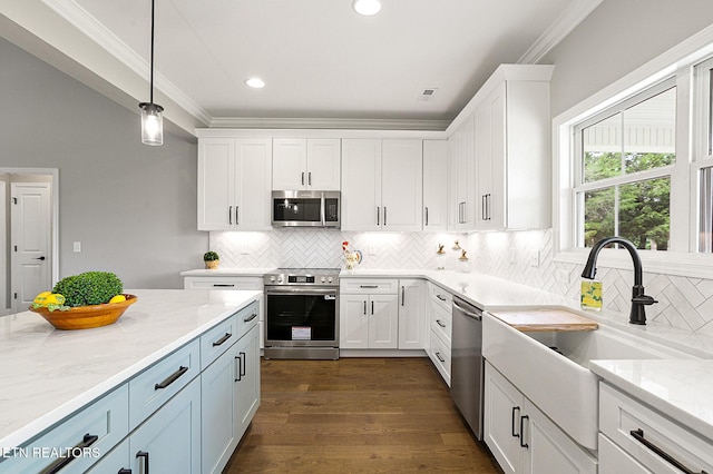 7245 Deville Way, Powell, TN 37849 - kitchen featuring stainless steel appliances, crown molding, white cabinetry, backsplash, and pendant lighting