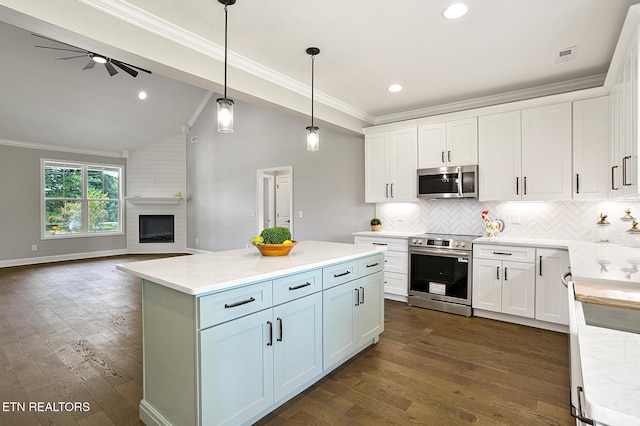 7245 Deville Way, Powell, TN 37849 - kitchen featuring stainless steel appliances, open floor plan, ornamental molding, white cabinets, and backsplash