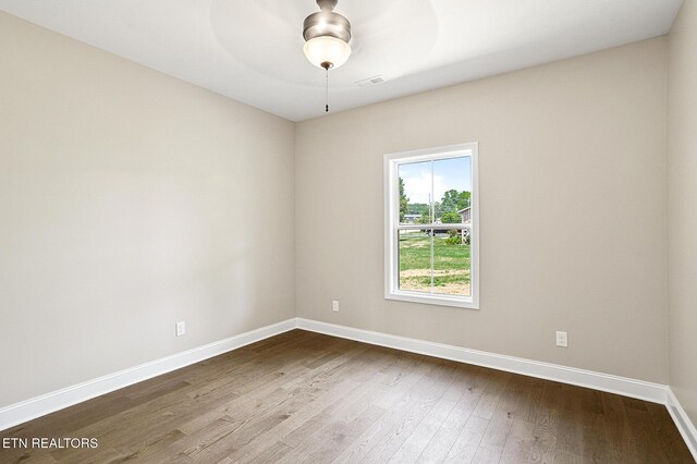 7245 Deville Way, Powell, TN 37849 - spare room featuring dark wood-type flooring and ceiling fan