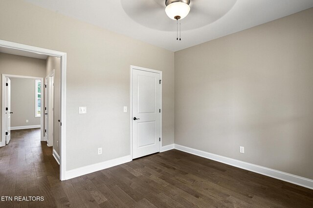 7245 Deville Way, Powell, TN 37849 - unfurnished bedroom with dark wood-style floors and a ceiling fan