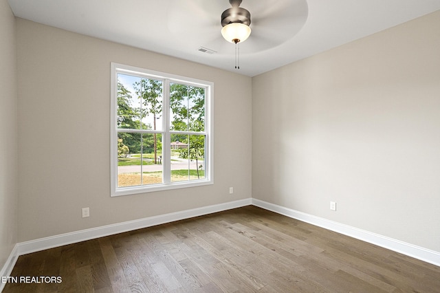 7245 Deville Way, Powell, TN 37849 - spare room with plenty of natural light, wood finished floors, and ceiling fan
