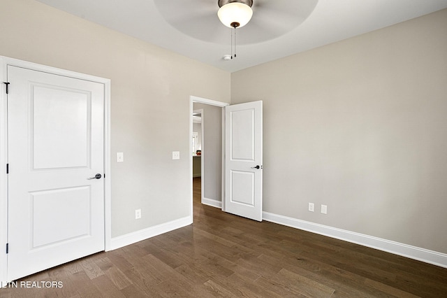 7245 Deville Way, Powell, TN 37849 - unfurnished bedroom with dark wood-type flooring and a ceiling fan