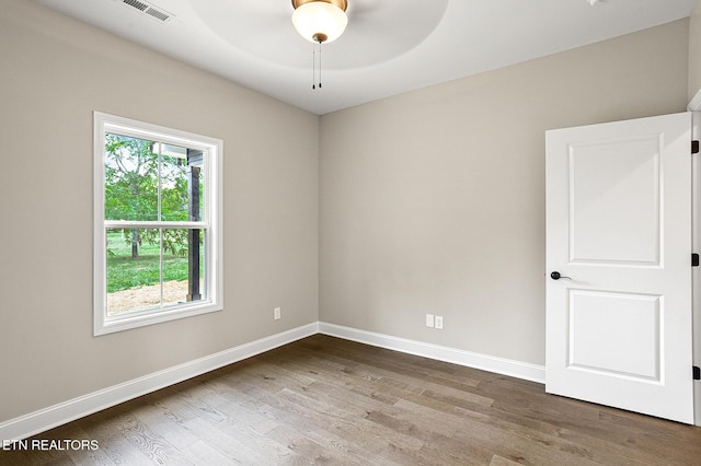 7245 Deville Way, Powell, TN 37849 - unfurnished room featuring wood finished floors and a ceiling fan