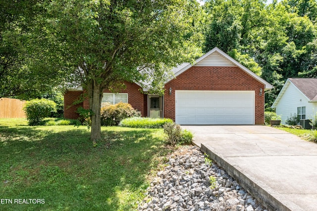 1032 Willow Creek Cir, Maryville, TN 37804 - view of front facade with a garage, driveway, and brick siding