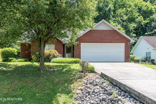 1032 Willow Creek Cir, Maryville, TN 37804 - view of front of property featuring driveway, an attached garage, brick siding, and a front yard