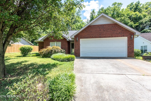 1032 Willow Creek Cir, Maryville, TN 37804 - view of front facade featuring brick siding, concrete driveway, and an attached garage