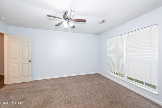 1032 Willow Creek Cir, Maryville, TN 37804 - spare room featuring carpet floors, ceiling fan, and a smoke detector