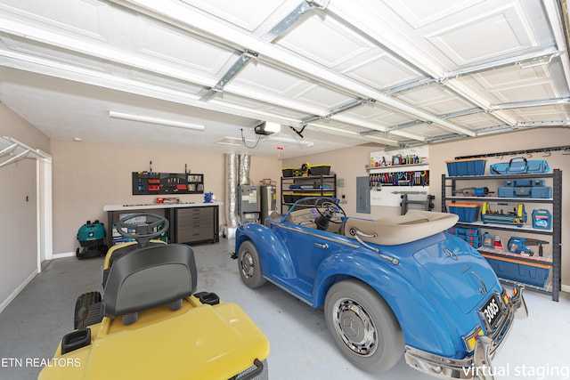 1032 Willow Creek Cir, Maryville, TN 37804 - garage featuring electric panel and a garage door opener
